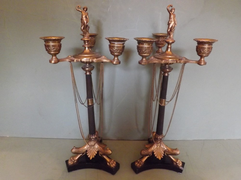 pair c19th french patinated bronze and ormolu candelabras in the empire taste