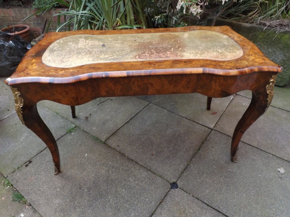 c19th burrwalnut and floral marquetry inlaid ormolumounted 'bureau plat' or writing table