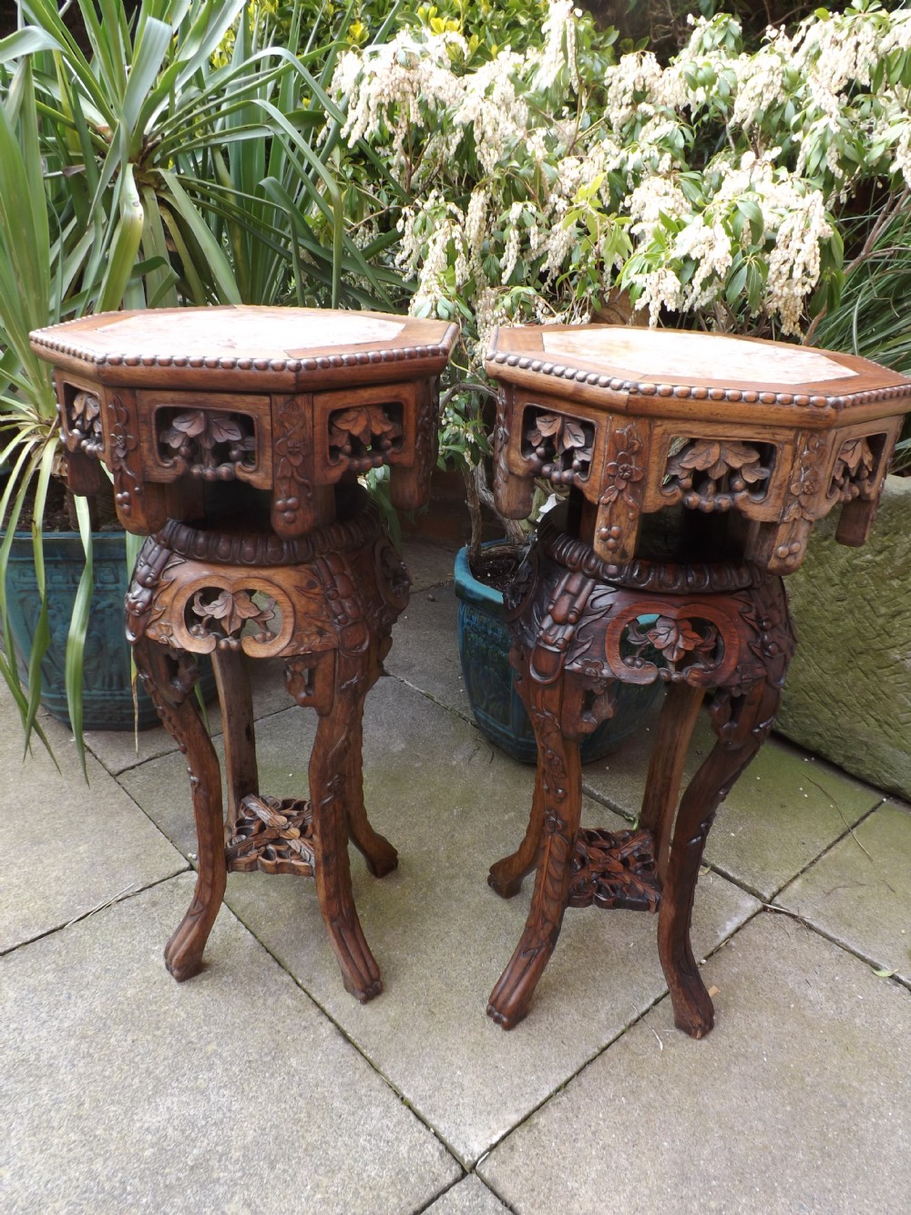 pair of late c19th chinese carved hardwood 'hongmu' inset marbletop jardinire or urn stands