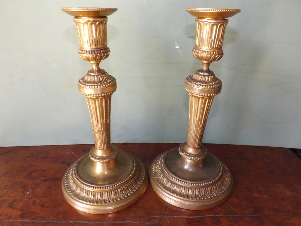pair of c19th gilt bronze candlesticks