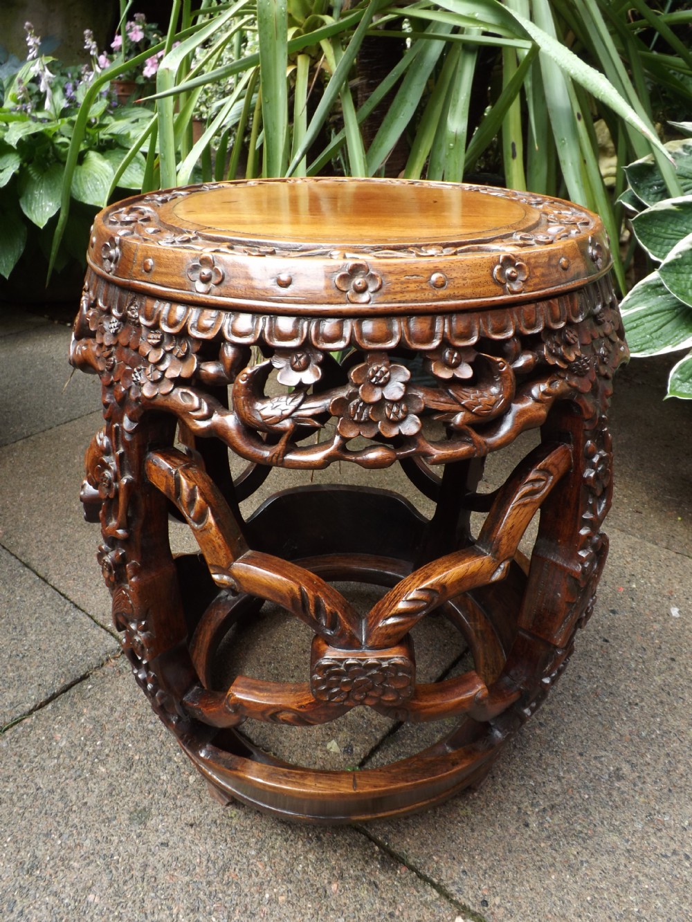 late c19th chinese qing dynasty heavily carved hardwood'hongmu' barrel stand or garden seat