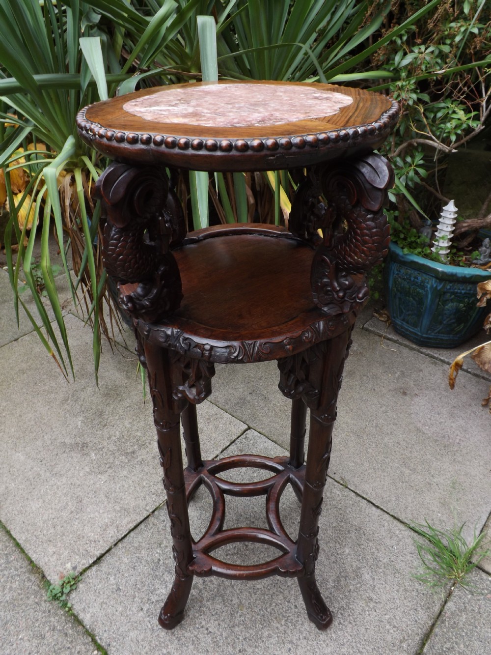late c19th chinese qing dynasty carved hardwood marbletop jardiniere stand of unusual form
