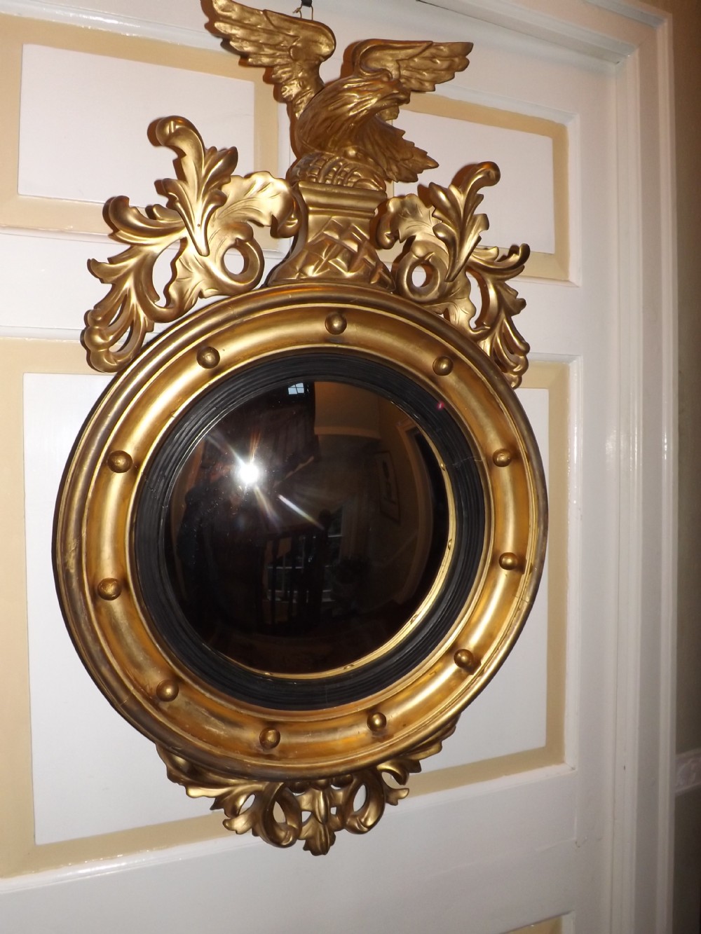 c19th regency period giltwood framed convex wall mirror
