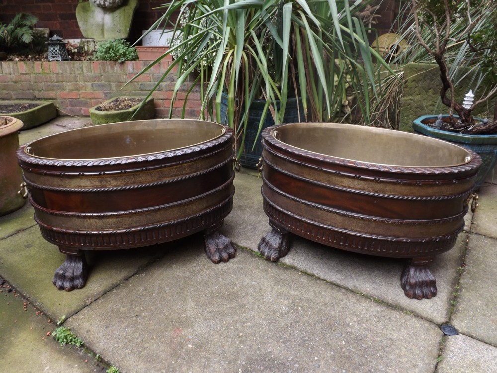pair of early c20th george ii design periodstyle brassbound oval mahogany winecoolers