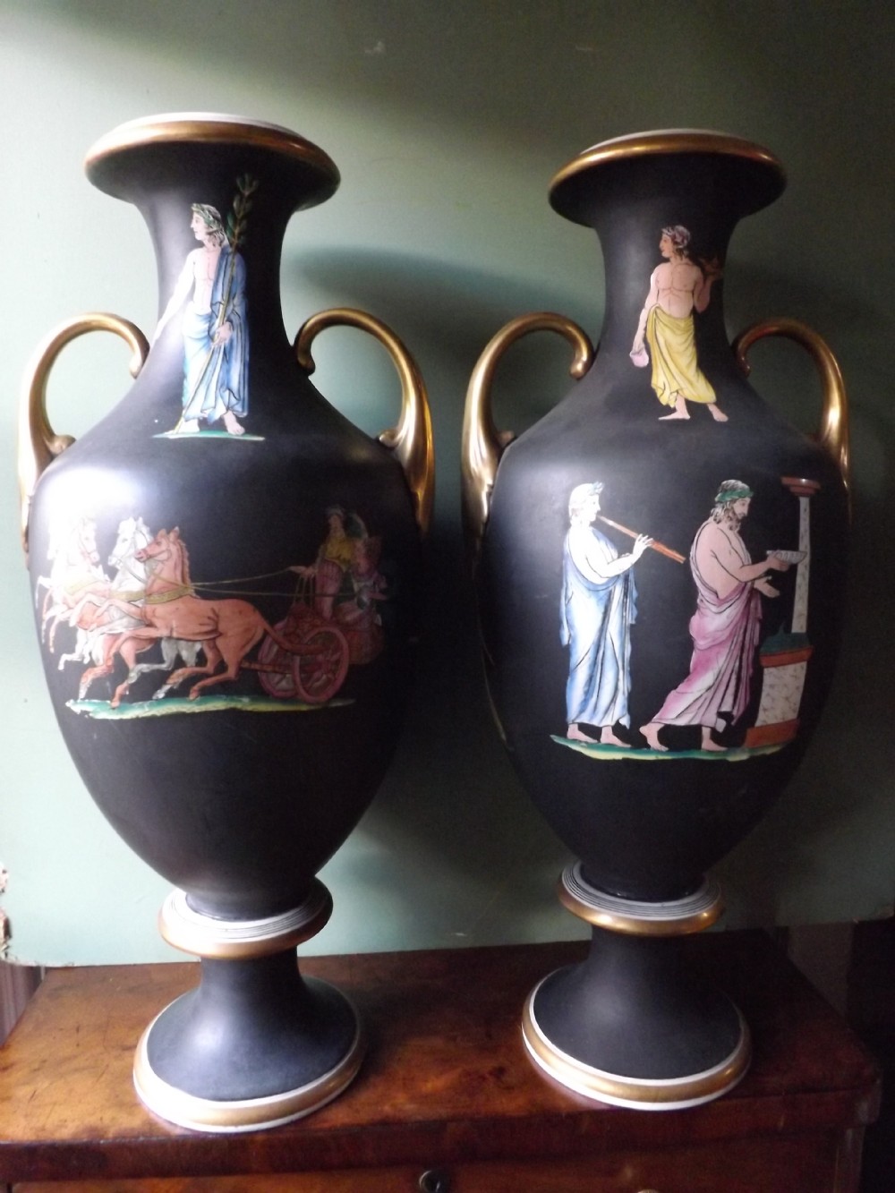 pair of mid c19th english porcelain vases in ancient grecoromano classical style