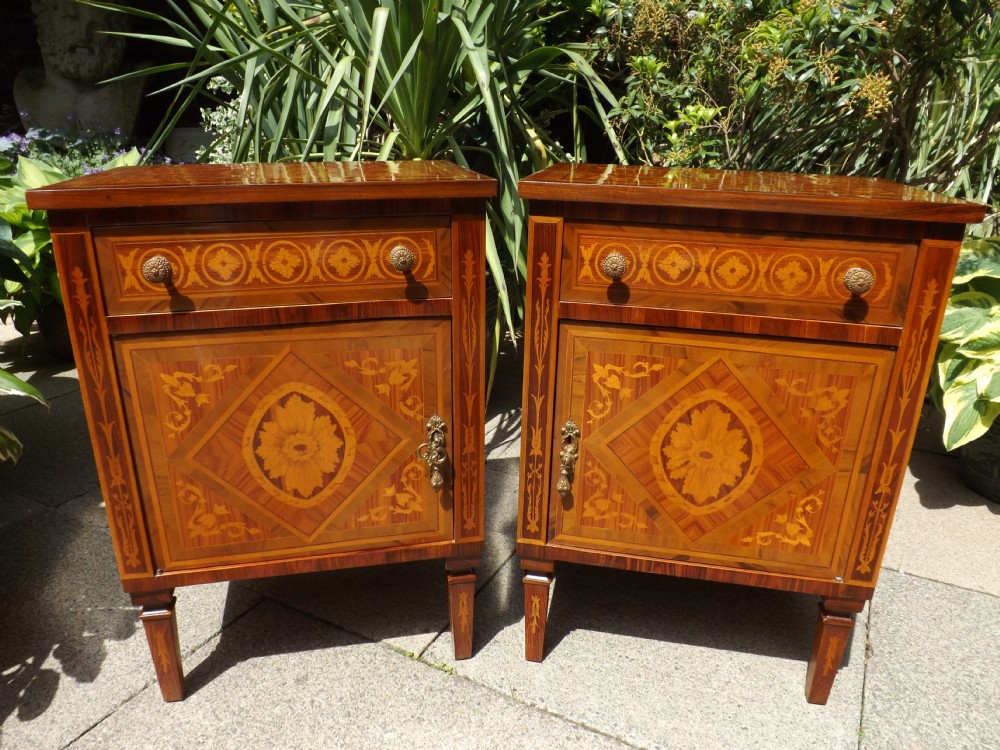 pair of early c20th northern italian inlaid walnut bedside cupboards in the late c18th style of the lombardy region