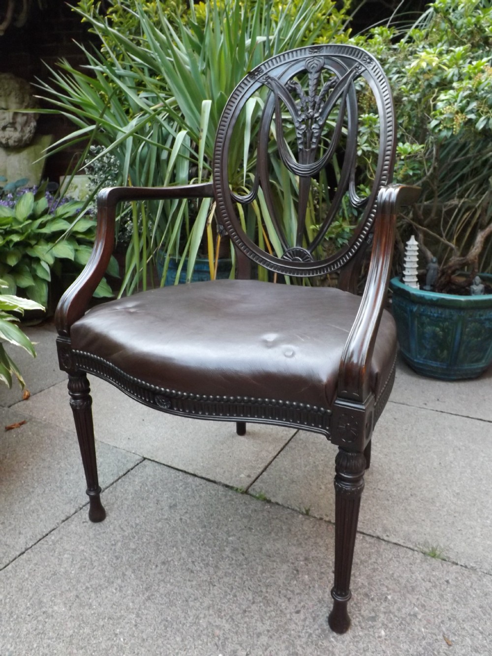 late c19thearly c20th carved mahogany armchair of adam revival design