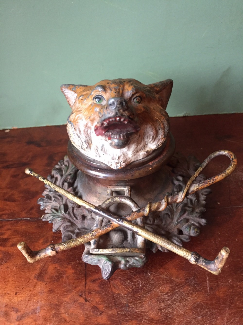 late c19thearly c20th 'coldpainted' cast bronze and brass foxhead inkwell