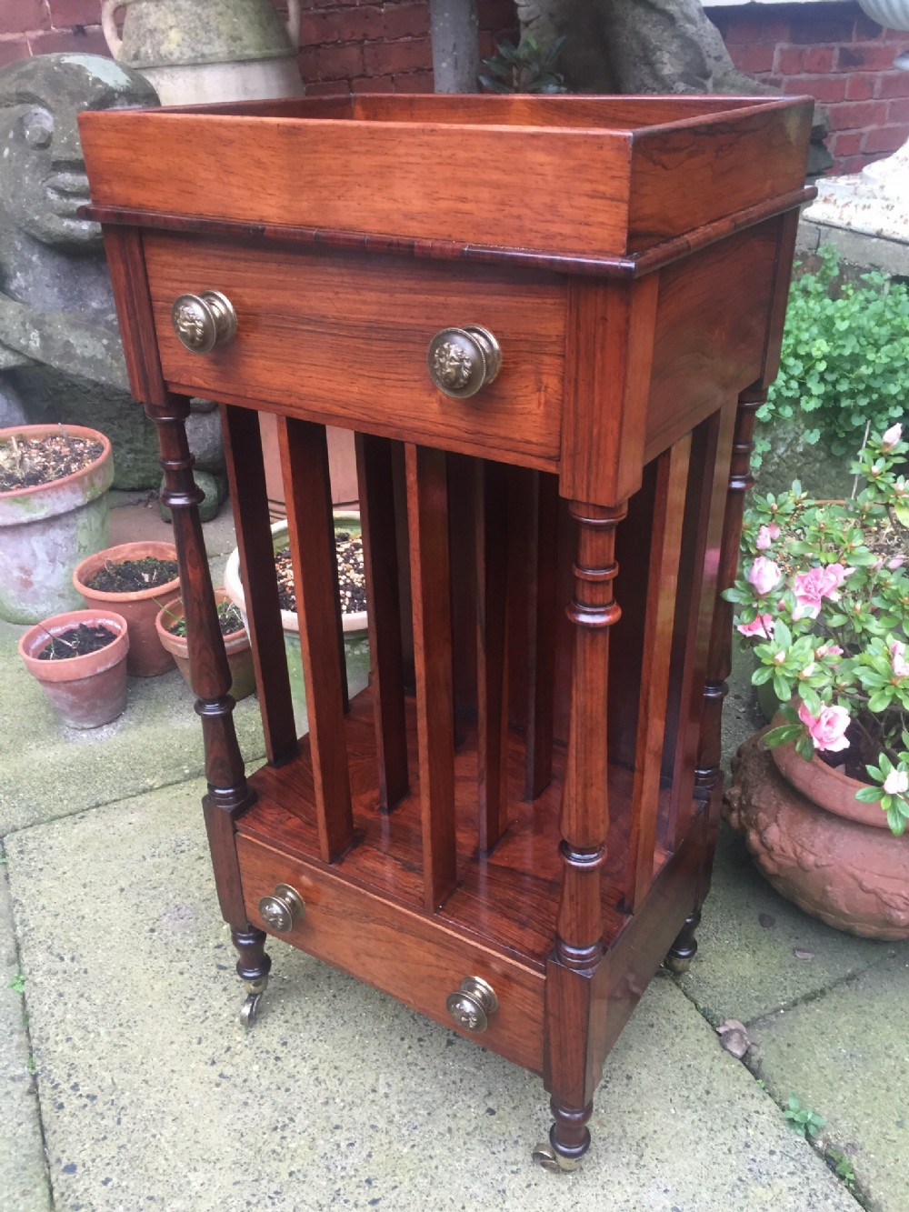 early c19th regency period rosewood etagere bookcasecanterburyfoliostand of unusual form