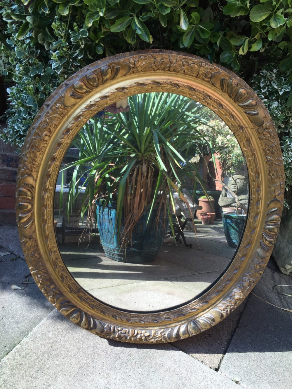 late c18th carved giltwood and gesso ovalframed mirror