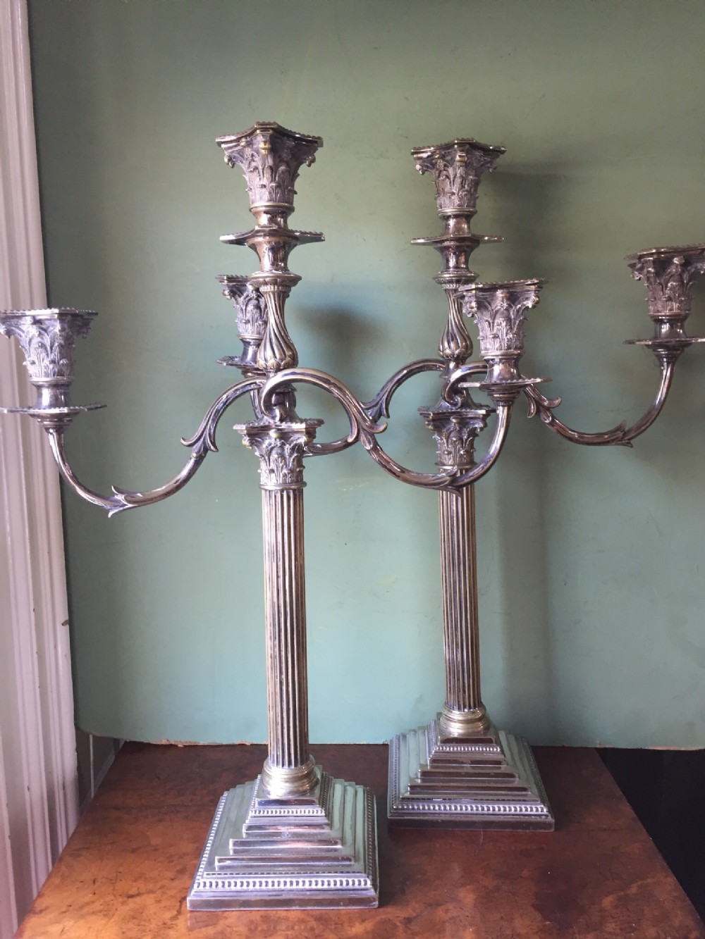 pair of late c19thearly c20th silverplated candelabras of classical design