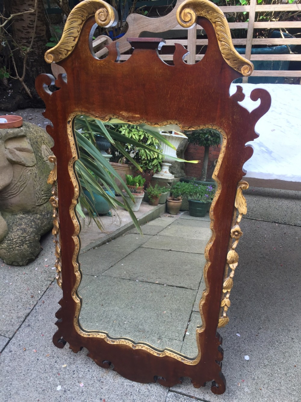 c19th george ii revival style mahogany and parcelgilt fret carved mirror