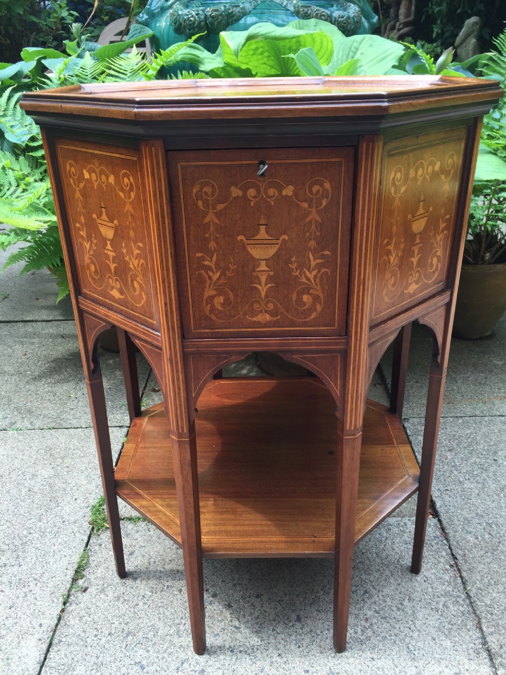 late c19thearly c20th edwardian inlaid mahogany centre table of unusual form