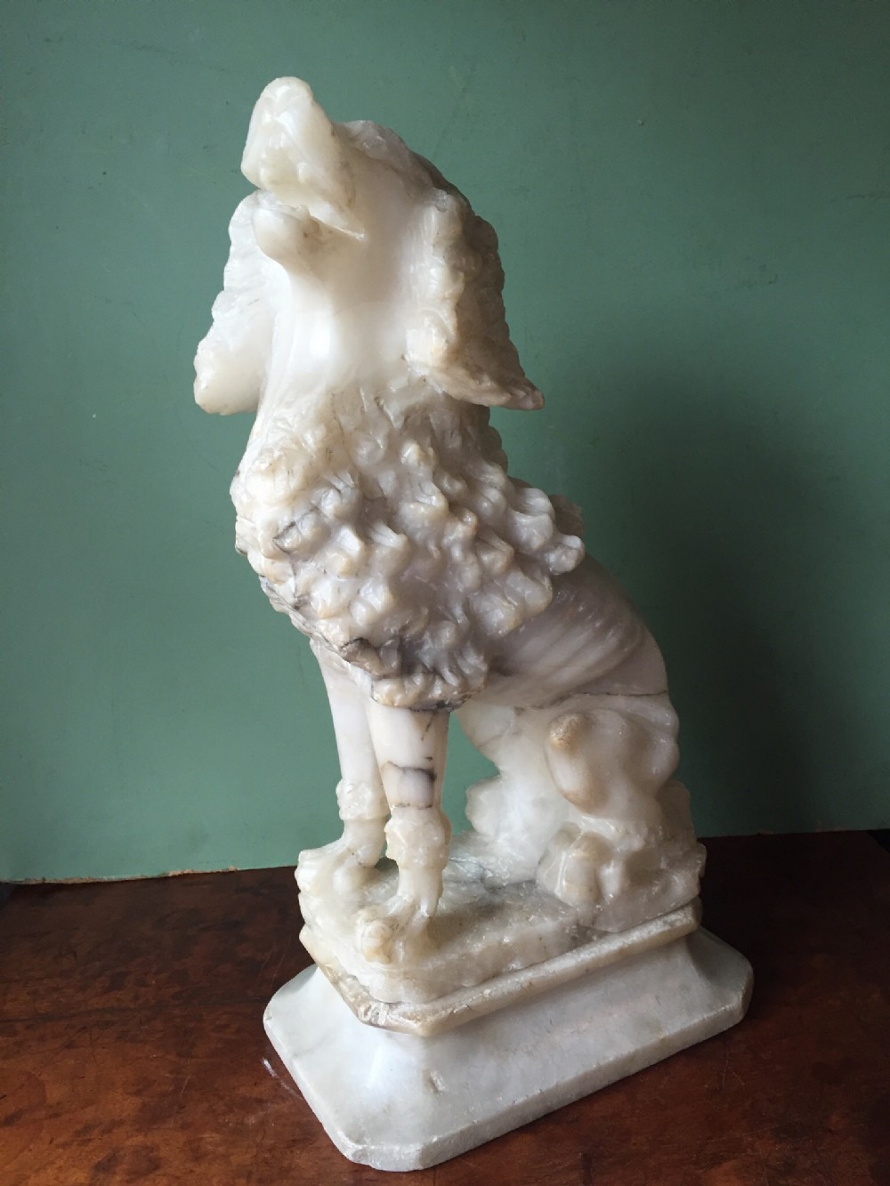 interesting c19th italian carved alabaster sculpture of a seated poodle