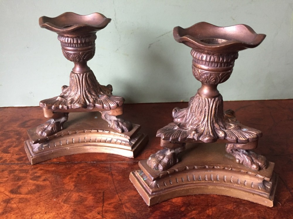 pair of early c19th regency period cast gilded bronze miniature candlesticks