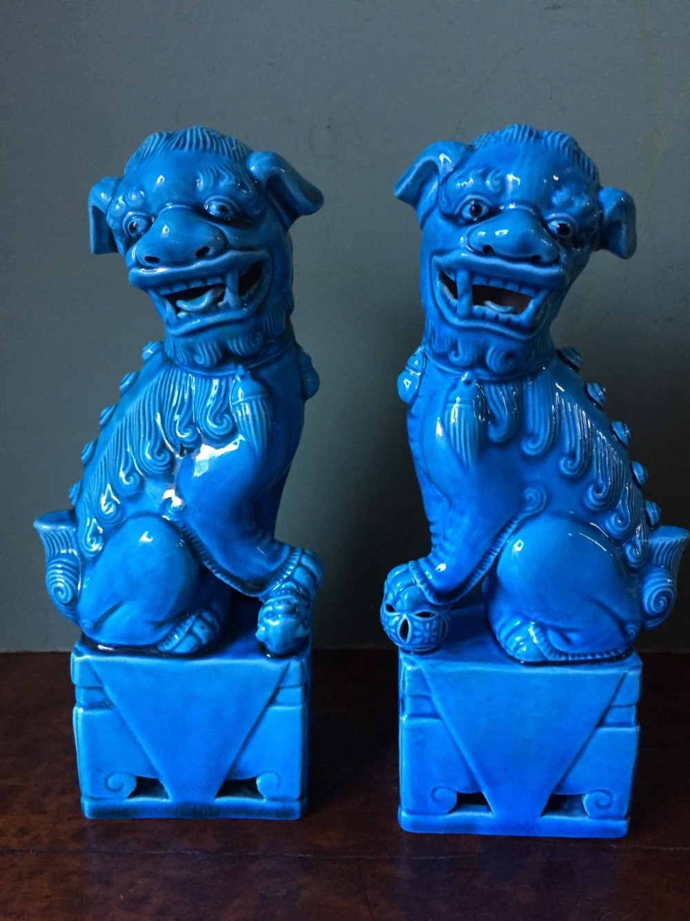 pair of early c20th chinese glazed turquoise pottery 'dogs of fo'