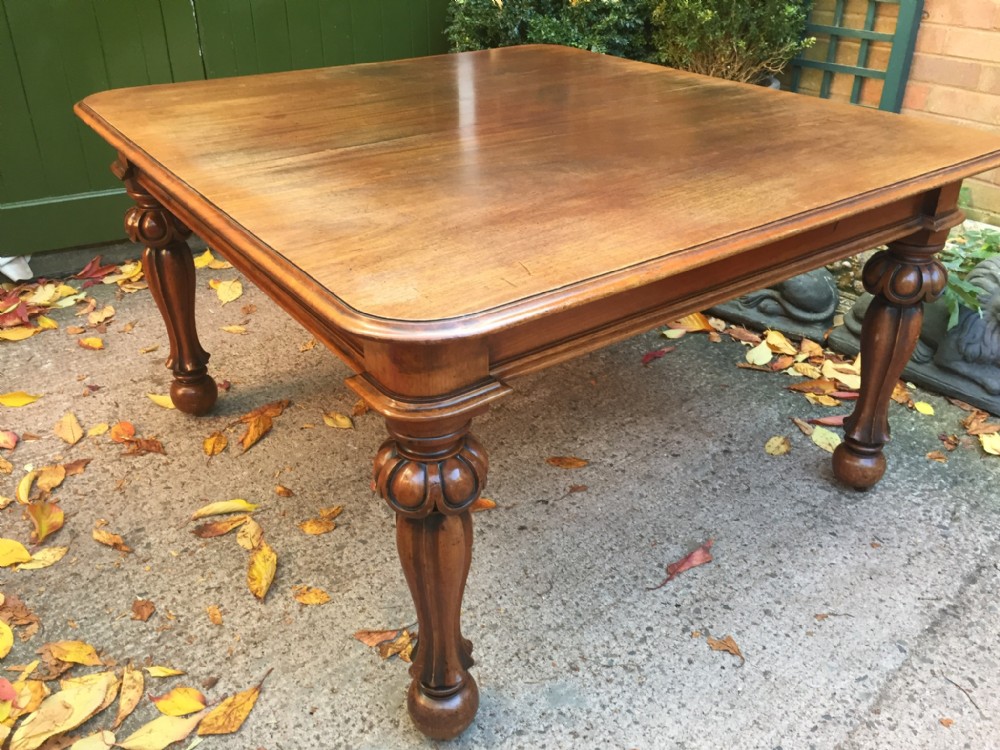 early c19th george iv period 'pullout' action extending mahogany dining table with 3 original extra leaves