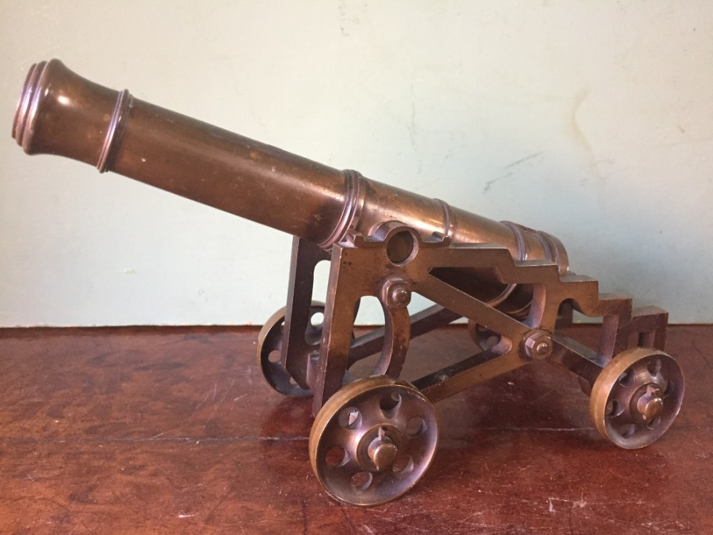 late c19th early c20th cast bronze scale model of an c18th cannon mounted upon wheeled carriage