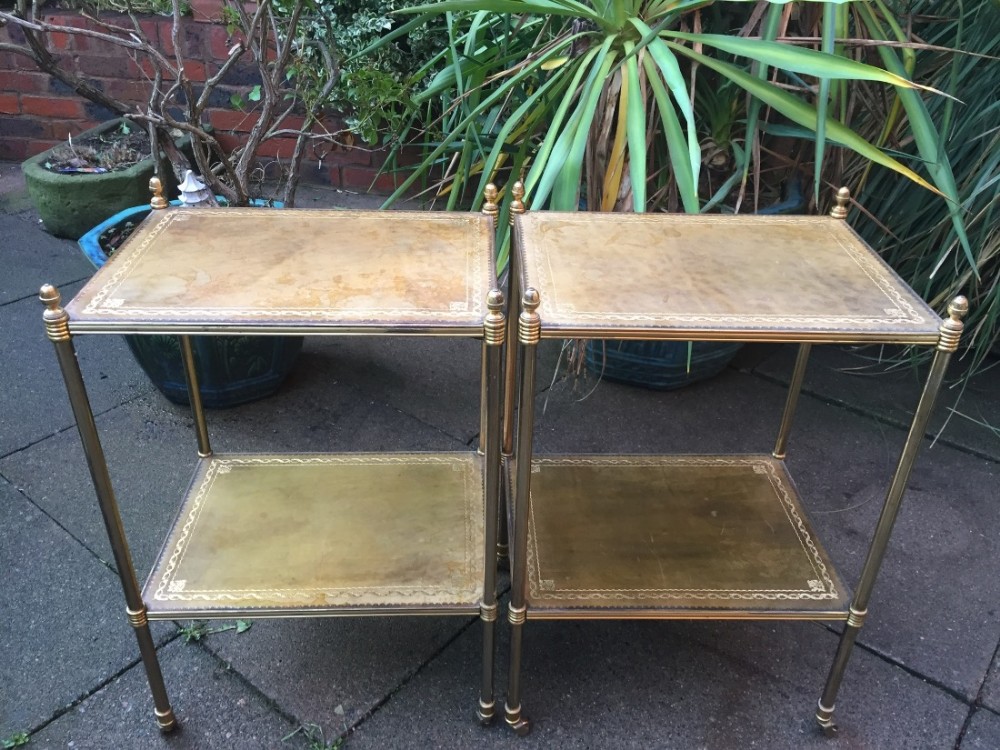 pair of early c20th lacquered tubular brassframed leathertopped 2tier etageres