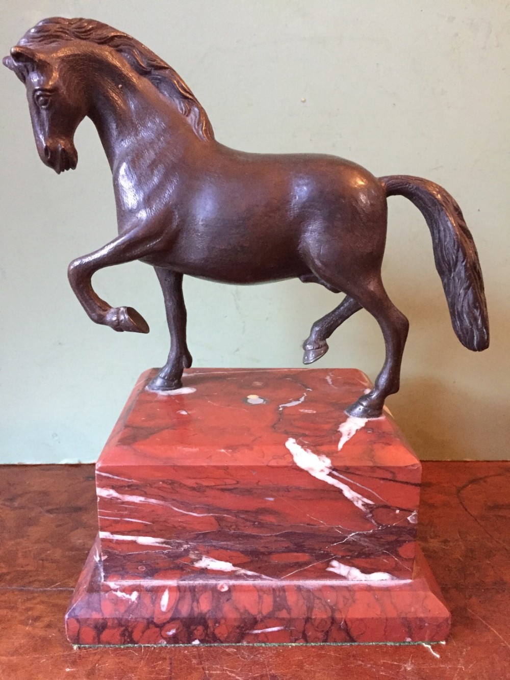 c19th italian bronze sculpture of a prancing horse in the renaissance manner mounted on a stepped rouge marble plinth base