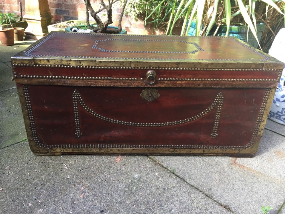 early c19th chinese export brassbound and studded burgundy leathercovered camphor trunk