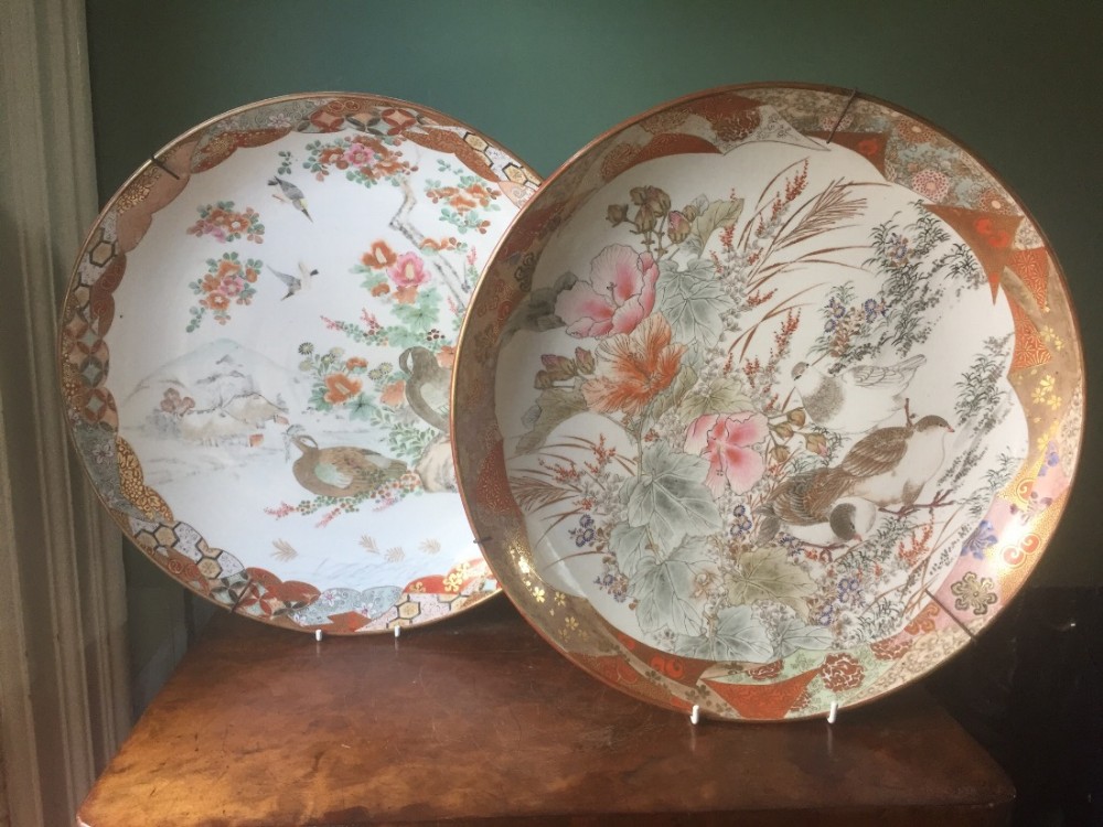 pair of late c19thearly c20th japanese meiji period kutani porcelain dishes or chargers