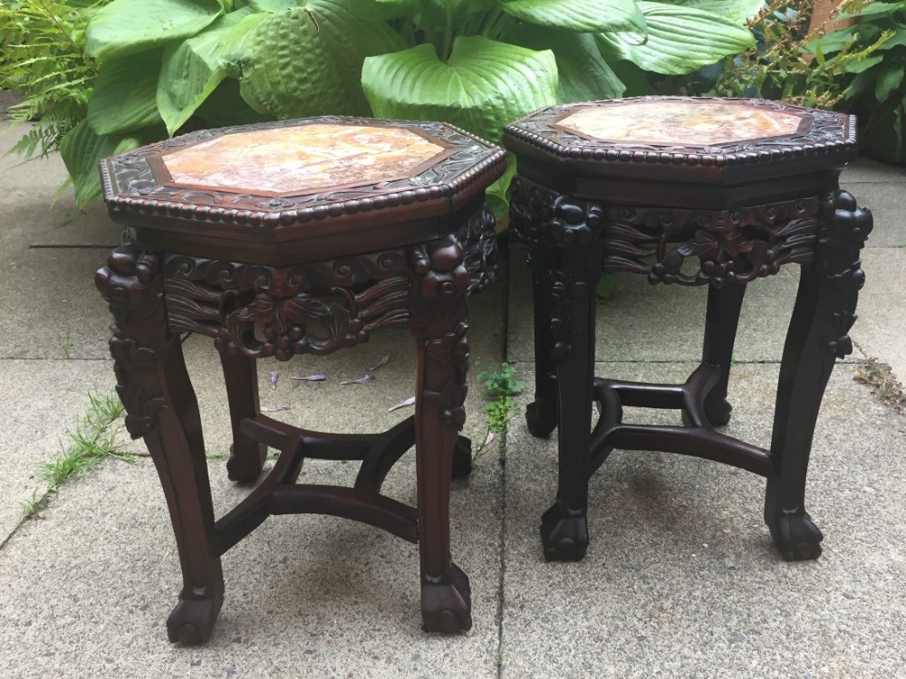 pair of late c19th chinese qing dynasty carved 'hongmu' octagonal marble top jardiniere stands or wineend tables