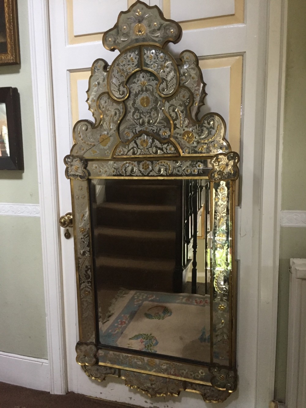 fine and decorative late c19th italian 'verre eglomise' venetian mirror with detailed engraving and gilded highlights and edges