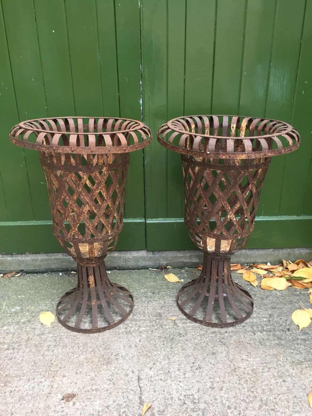 decorative pair of early c20th french strapiron open latticework garden vases of campana form