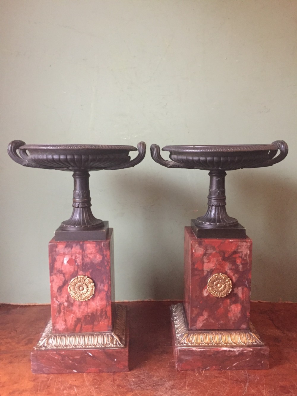 pair of early c19th french neoclassical empire design bronze tazzas on ormolumounted rouge marble vases