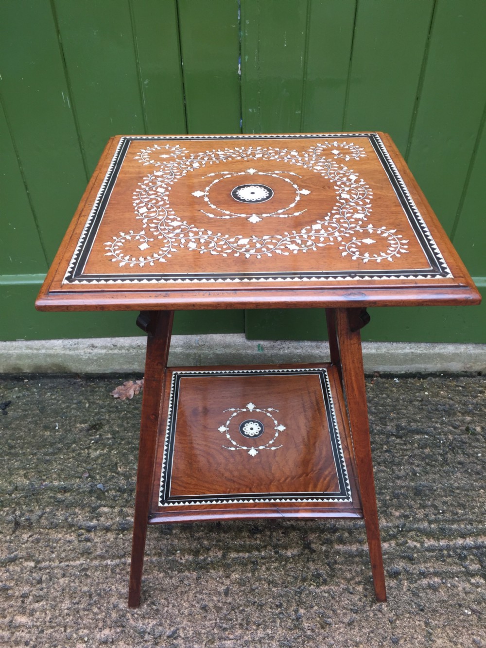 late c19th angloindian twotier teak lamp table with ivory and ebony design inlay