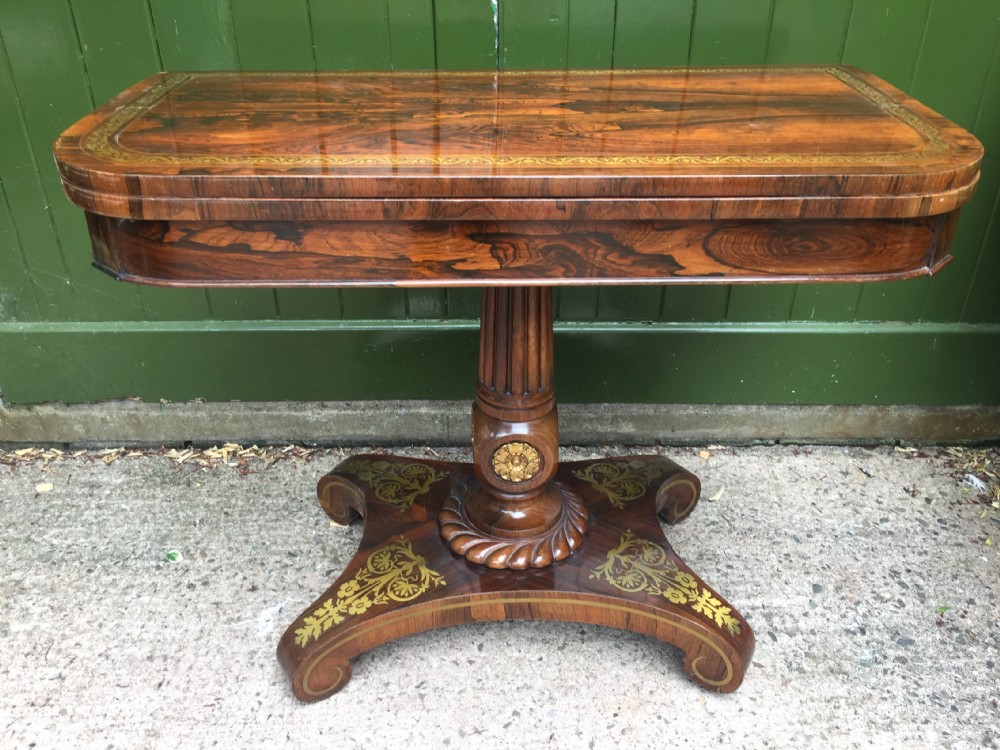exceptional early c19th george iv period brassinlaid and giltbrass mounted finelyfigured rosewood foldover card or games table