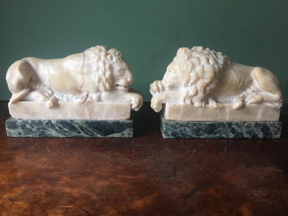 pair of c19th italian carved alabaster 'grand tour' souvenir lions after antonio canova