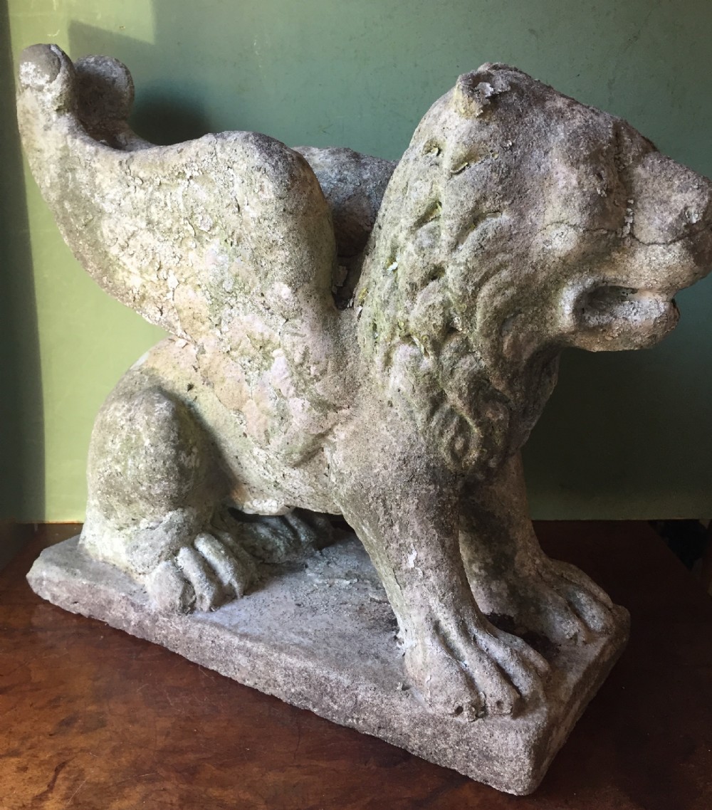 early c20th composition stone sculpture of a winged lion probably depicting the lion of st mark