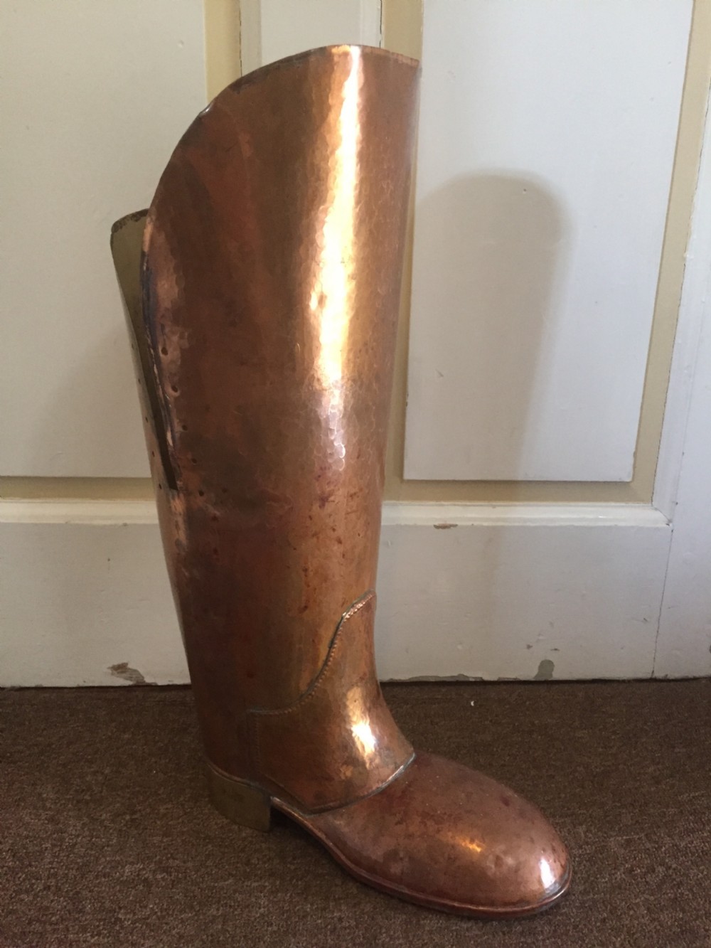 interesting and decorative early c20th copper and brass umbrella or stickstand fashioned as a coachman's boot