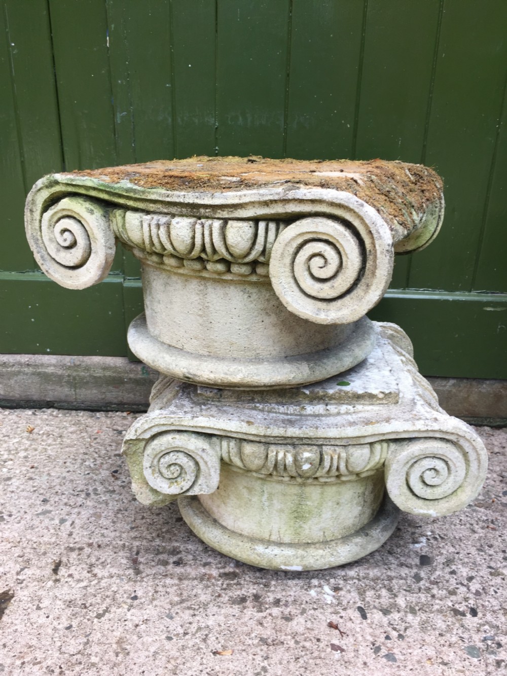 decorative pair of early c20th composition stone ionic capitals