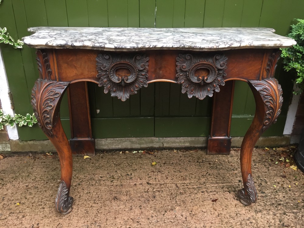 exhuberant c19th irish walnut console table with a rare breccia marble slab top