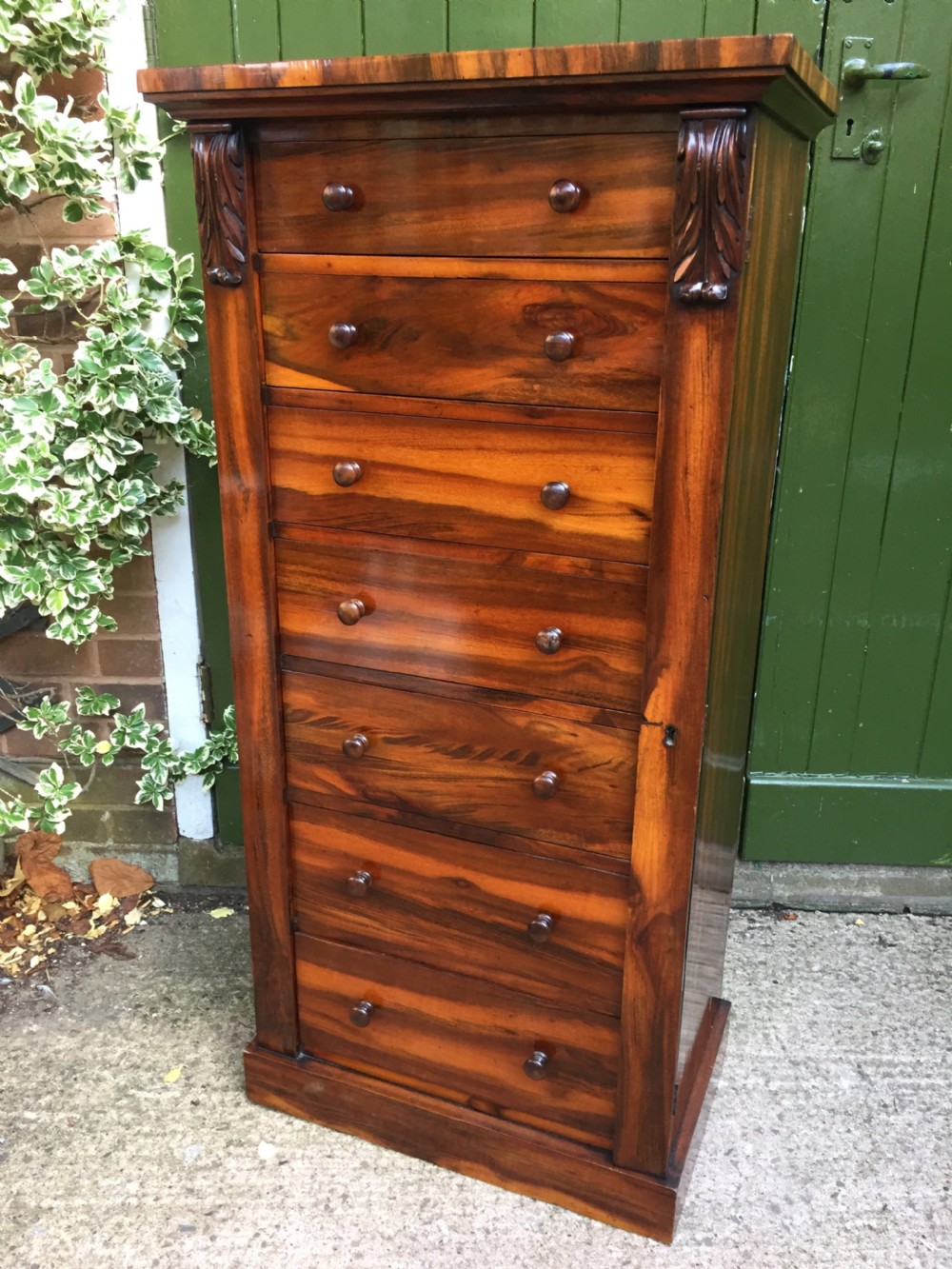 fine quality early c19th george iv period wellington chest of drawers in rare gonalo alves timber