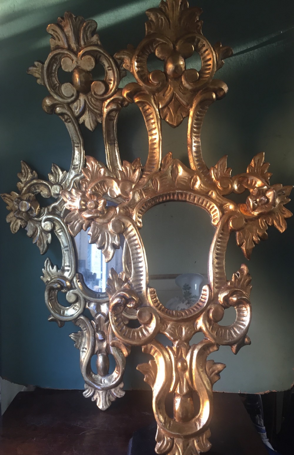 pair of early c20th italian carved giltwood framed mirrors in the c17th period venetian style