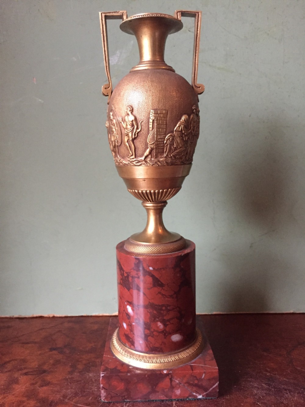 fine quality early c19th french neoclassical giltbronze urn on a 'rouge griotte' marble base