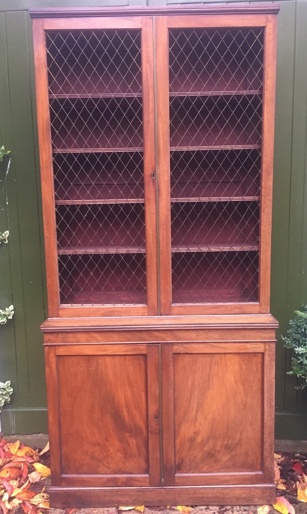 late c18th early c19th george iii period mahogany 2door bookcase with grille door top and cupboard base