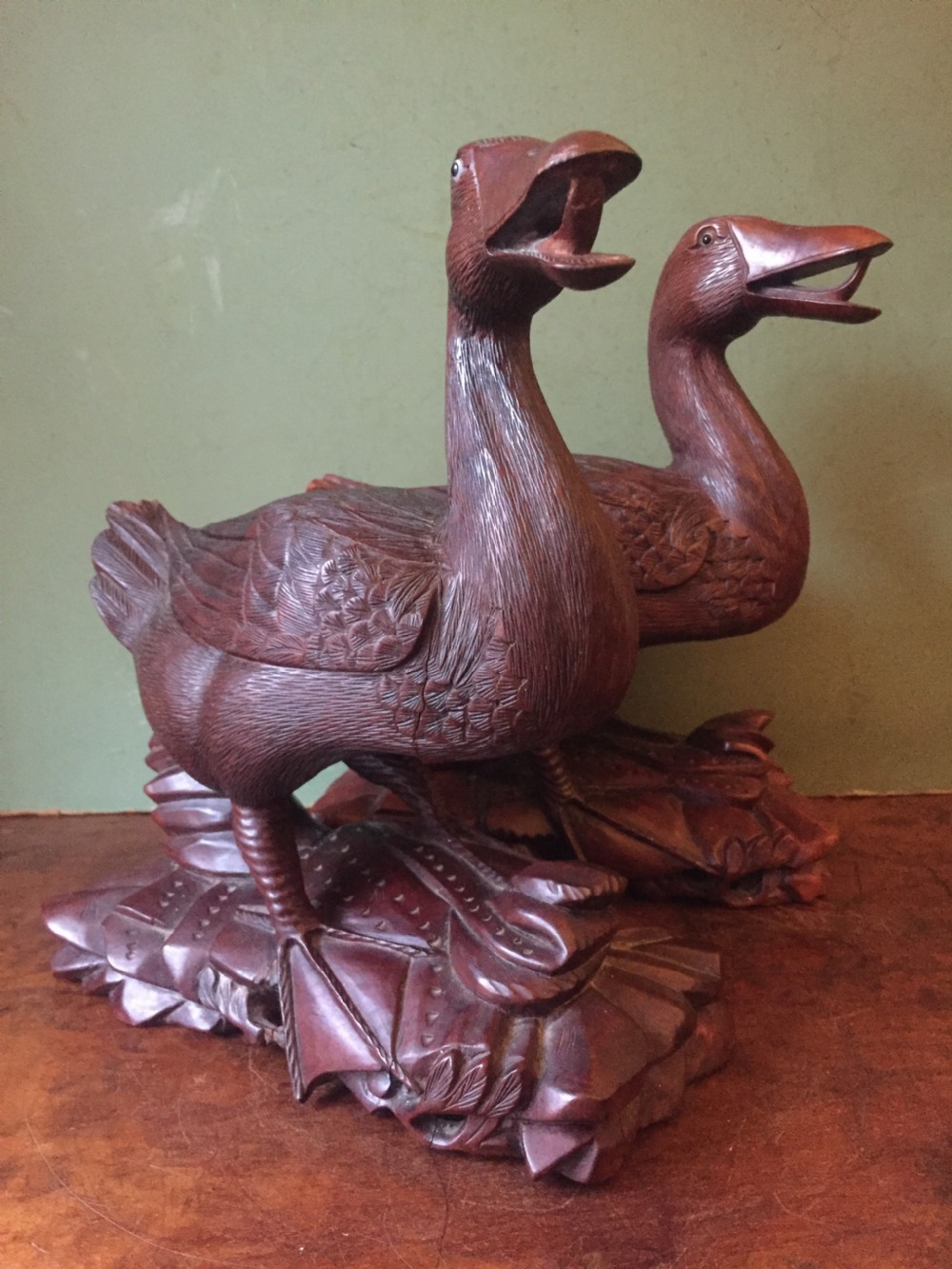 pair of late c19th chinese qing dynasty carved hardwood sculptures of auspicious mandarin ducks