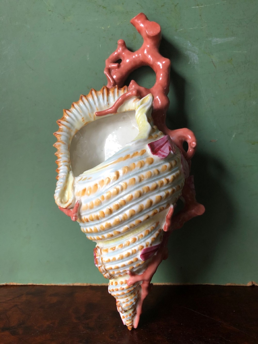 c19th royal worcester porcelain wallpocket modelled as a seashell wrapped with coral branches