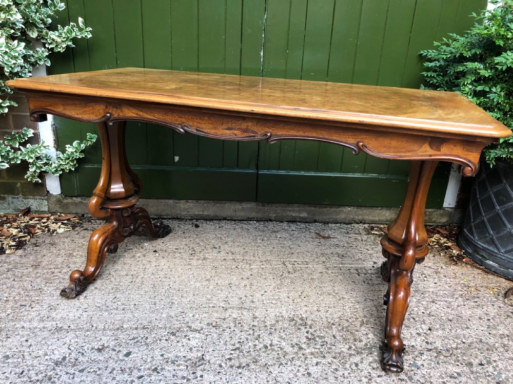mid c19th early victorian period carved walnut centre or library table of freestanding form