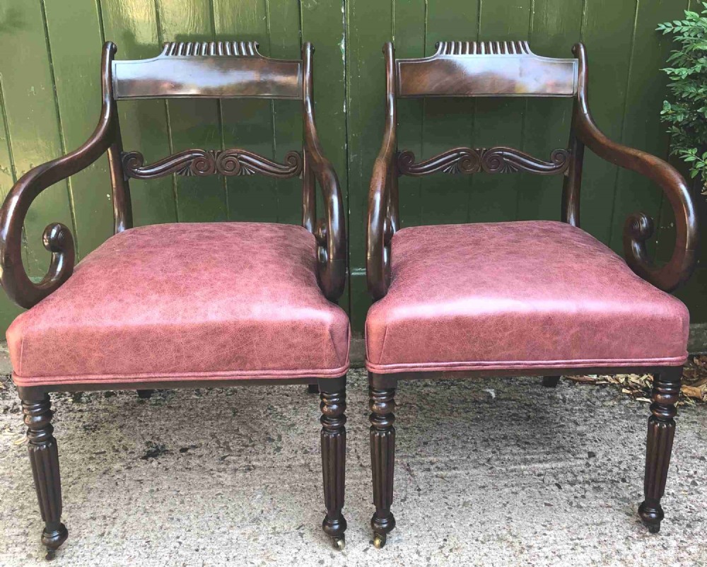 pair of early c19th regency period mahogany library desk or office armchairs