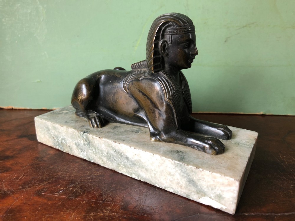 early c19th bronze sculpture study of a sphinx mounted on a verde mare marble base
