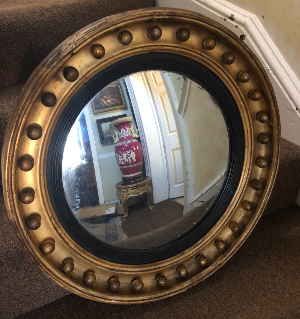 early c19th regency period giltwood framed convex mirror
