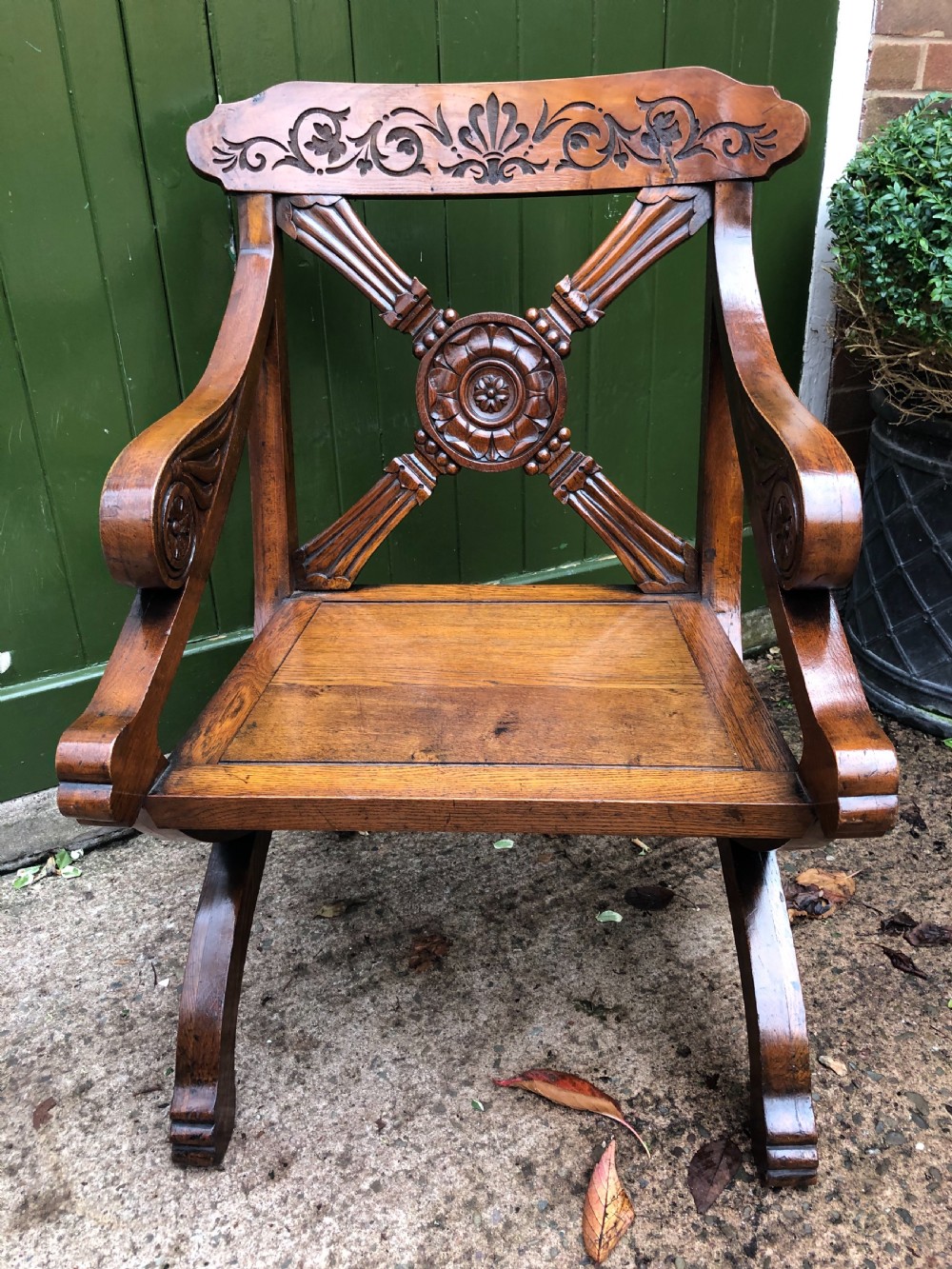 interesting c19th carved oak armchair of classically inspired form