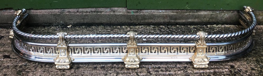 high quality decorative late c19th gilt brass and polished steel fireplace curb or fender
