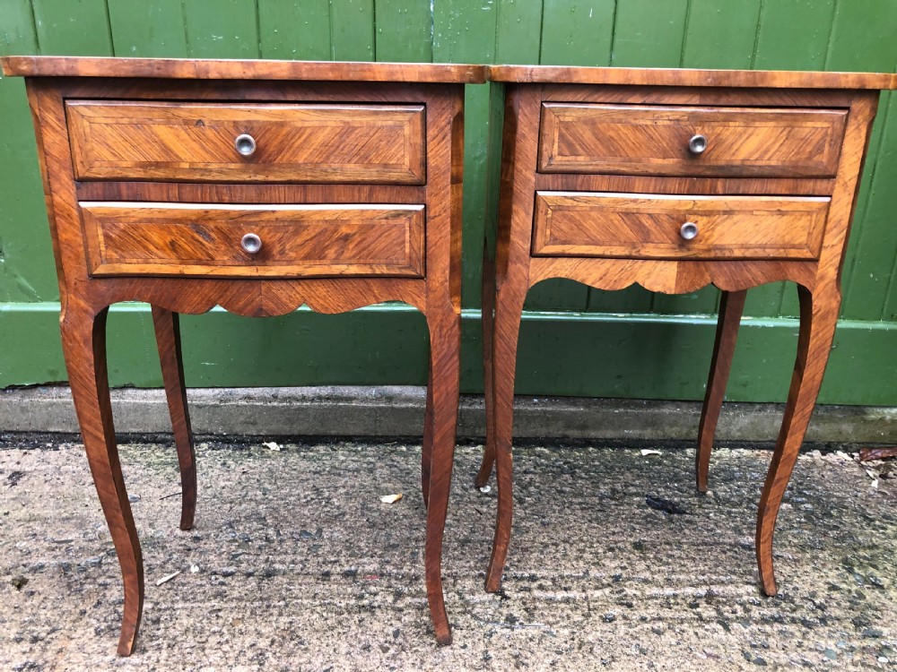 pair of elegant early c20th french kingwood bedside tables of serpentine outline